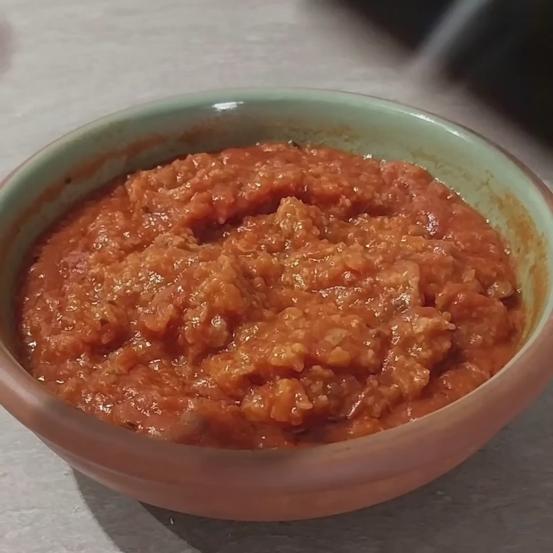 Chili Pepper Infused Extra Virgin Olive Oil poured over risotto