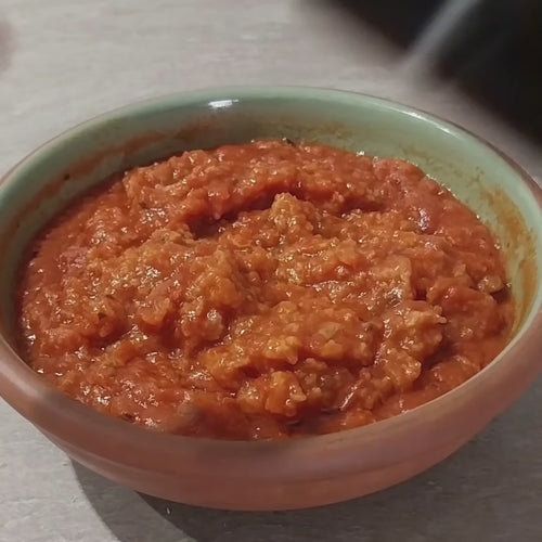 Chili Pepper Infused Extra Virgin Olive Oil poured over risotto