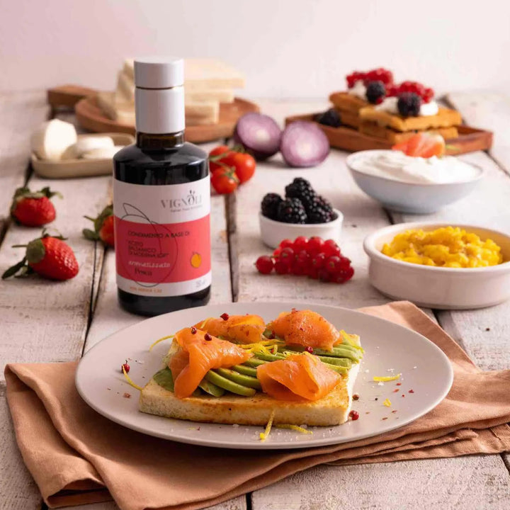 Vignoli Peach Infused Balsamic Vinegar front of 8.5oz bottle with salmon avocado toast